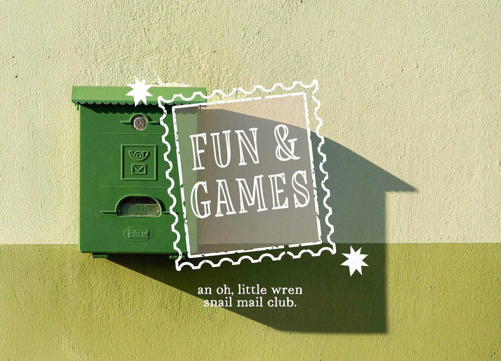 mockup up of the first month's mailing--a newspaper, game board, punch card, activity tickets, and waiting game card